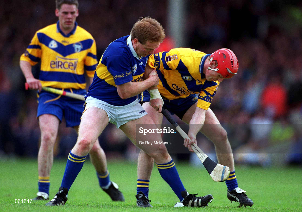 6 May 2001; Declan Ryan of Tipperary in action against Brian Lohan of Clare during the Allianz National Hurling League Final match between Tipperary and Clare at the Gaelic Grounds in Limerick. Photo by Ray McManus/Sportsfile