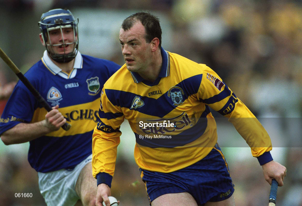 6 May 2001; Ollie Baker of Clare gets away from Eoin Kelly of Tipperary during the Allianz National Hurling League Final match between Tipperary and Clare at the Gaelic Grounds in Limerick. Photo by Ray McManus/Sportsfile