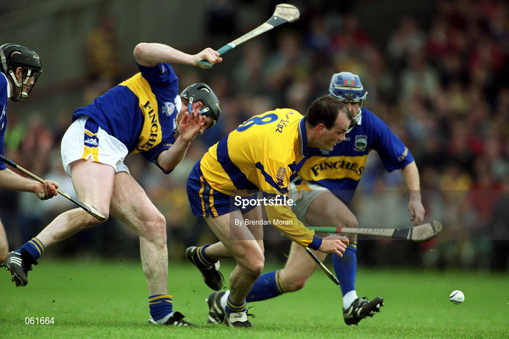 6 May 2001; Ollie Baker of Clare in action against Conor Gleeson of Tipperary during the Allianz National Hurling League Final match between Tipperary and Clare at the Gaelic Grounds in Limerick. Photo by Brendan Moran/Sportsfile *** Local Caption ***