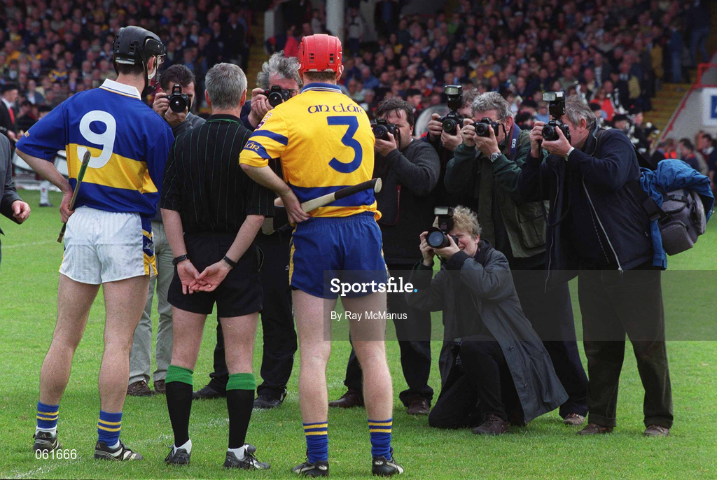 6 May 2001; Referee Pat O'Connor with team captains Thomas Dunne of Tipperary and Brian Lohan of Clare before the Allianz National Hurling League Final match between Tipperary and Clare at the Gaelic Grounds in Limerick. Photo by Ray McManus/Sportsfile
