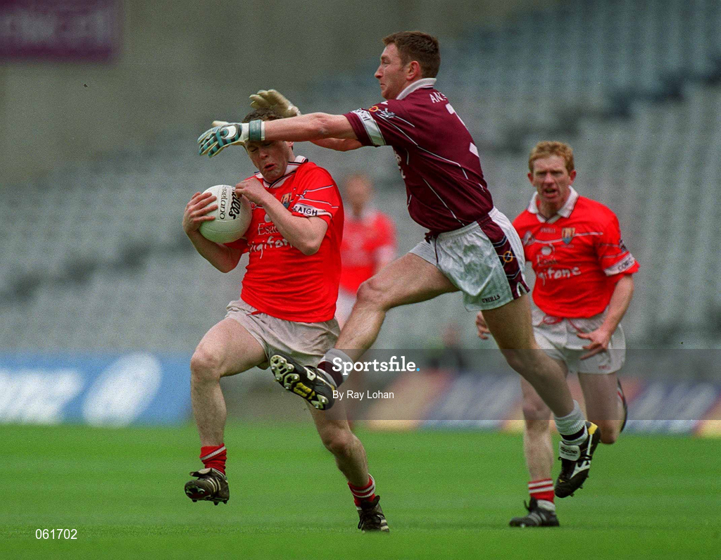 29 April 2001; Michael O'Donovan of Cork in action against David Mitchell of Westmeath during the Allianz GAA National Football League Division 2 Final match between Westmeath and Cork at Croke Park in Dublin. Photo by Ray Lohan/Sportsfile