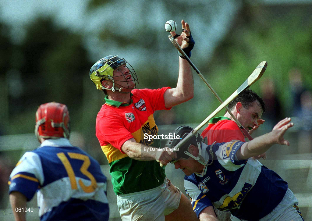 29 April 2001; Des Murphy of Carlow in action against David Cuddy of Laois during the Guinness Leinster Senior Hurling Championship Preliminary Round match between Carlow and Laois at Dr Cullen Park in Carlow. Photo by Damien Eagers/Sportsfile