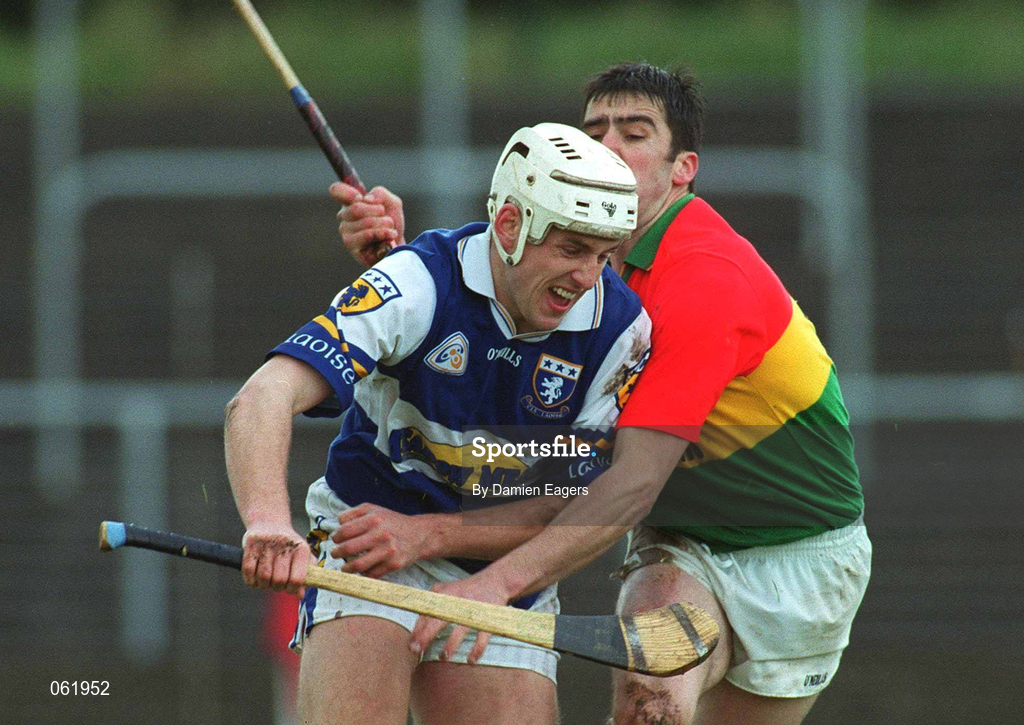 29 April 2001; Darren Rooney of Laois in action against Thomas Doyle of Carlow during the Guinness Leinster Senior Hurling Championship Preliminary Round match between Carlow and Laois at Dr Cullen Park in Carlow. Photo by Damien Eagers/Sportsfile