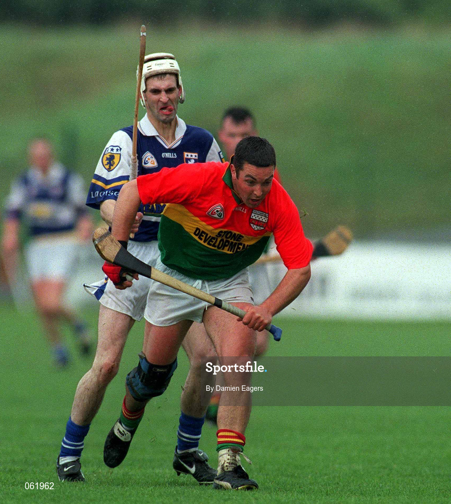 29 April 2001; Pauric Keogh of Carlow in action against Pat Phelan of Laois during the Guinness Leinster Senior Hurling Championship Preliminary Round match between Carlow and Laois at Dr Cullen Park in Carlow. Photo by Damien Eagers/Sportsfile