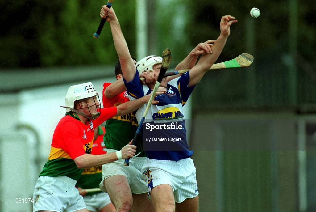 29 April 2001; Darren Rooney of Laois in action against Edward Coady, left, and Thomas Doyle of Carlow during the Guinness Leinster Senior Hurling Championship Preliminary Round match between Carlow and Laois at Dr Cullen Park in Carlow. Photo by Damien Eagers/Sportsfile