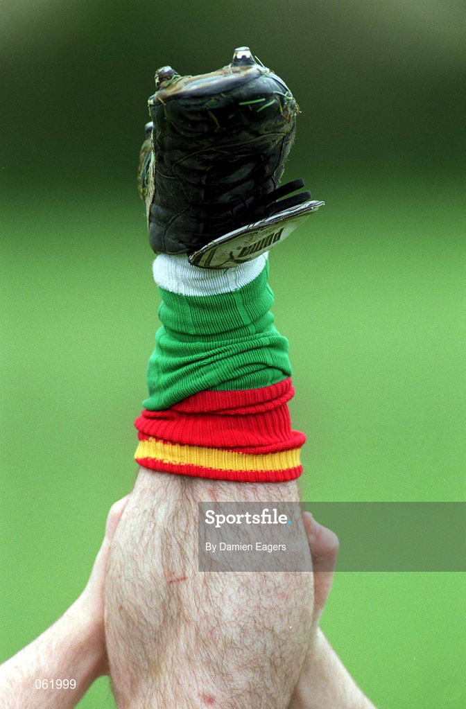 29 April 2001; A Carlow player stretches before the Guinness Leinster Senior Hurling Championship Preliminary Round match between Carlow and Laois at Dr Cullen Park in Carlow. Photo by Damien Eagers/Sportsfile