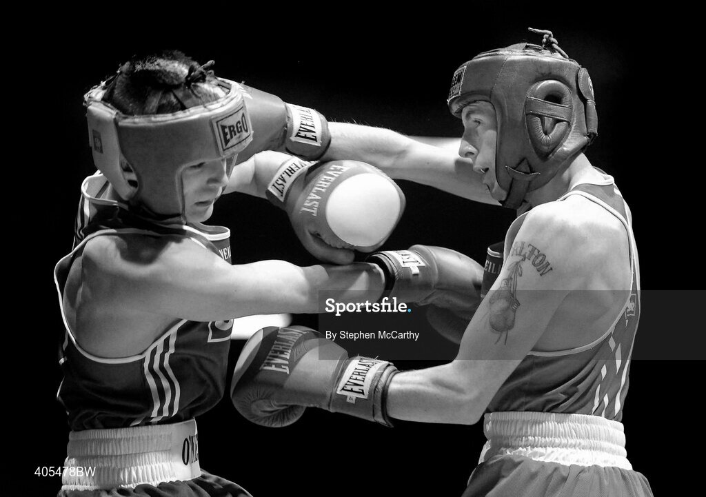 20 February 2010; Ruairi Dalton, Holy Trinity, red, exchanges punches with Gary Molly, Moate, during their 51kg bout. National Boxing Championships - Semi-Finals, National Stadium, Dublin. Picture credit: Stephen McCarthy / SPORTSFILE