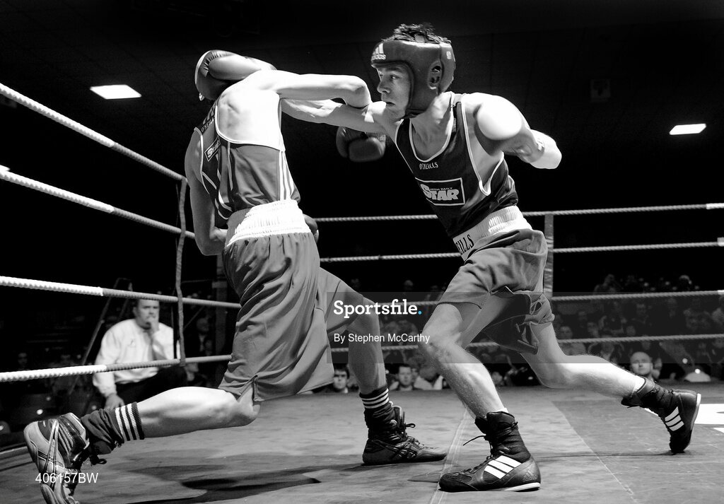 27 February 2010; Conor Ahern, Baldoyle, right, exchanges punches with Michael Conlan, St. John Bosco, during their 51kg bout. National Mens Elite Championships Semi-Finals - Saturday, National Stadium, Dublin. Picture credit: Stephen McCarthy / SPORTSFILE