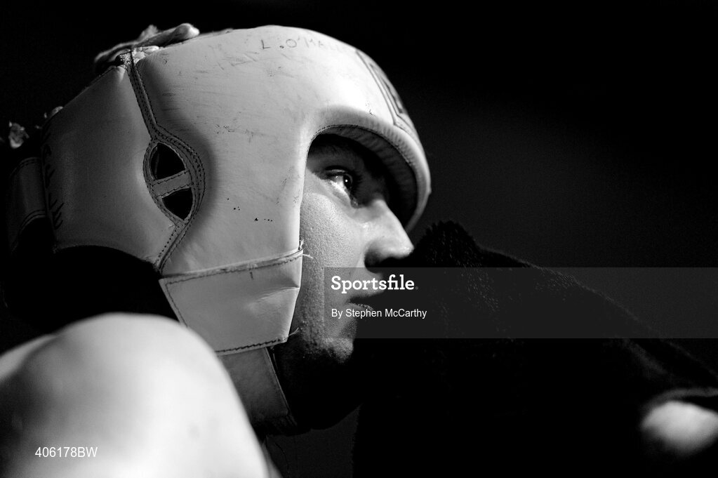 27 February 2010; Niall Forde, Eagle, has his face wiped between rounds during his 91+kg novice quarter final bout with Peter Cassidy, Ballyhaunis. National Mens Elite Championships Semi-Finals - Saturday, National Stadium, Dublin. Picture credit: Stephen McCarthy / SPORTSFILE