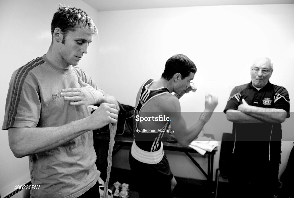 27 February 2010; Sonny Upton, Holy Family Golden Gloves, and trainer Gerry Storey, prepares for his 64kg bout with Stephen Donnelly, All Saints, while Roy Sheehan, St Michaels Athy, left, prepares for his 69kg bout with John Joe Joyce, St Michaels Athy. National Mens Elite Championships Semi-Finals - Saturday, National Stadium, Dublin. Picture credit: Stephen McCarthy / SPORTSFILE