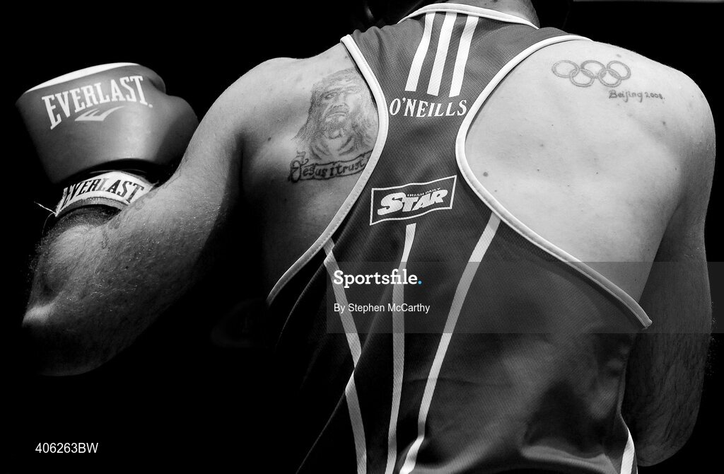 27 February 2010; John Joe Joyce, St Michaels Athy, supports tatoos during his 69kg bout against Roy Sheehan, St Michaels Athy. National Mens Elite Championships Semi-Finals - Saturday, National Stadium, Dublin. Picture credit: Stephen McCarthy / SPORTSFILE