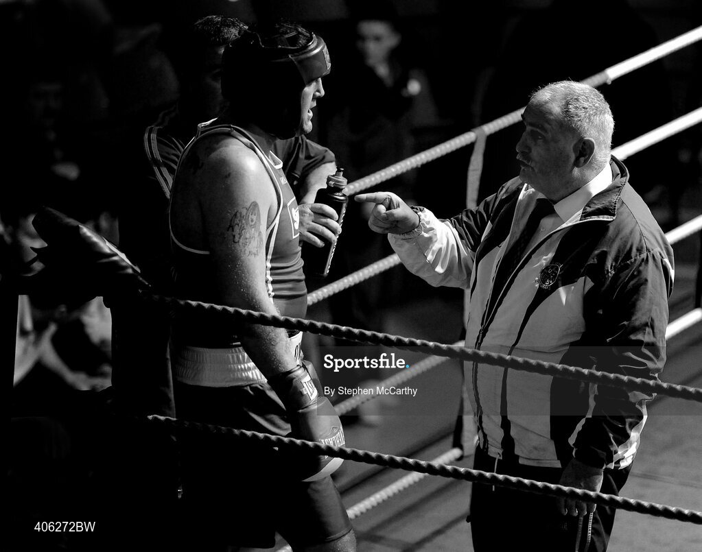27 February 2010; Tommy Sheehan, St Michaels Athy, is spoken to by trainer Dominic O'Rourke, President of the Irish Amateur Boxing Association, during their 91+kg bout with Gareth Smith, Crumlin. National Mens Elite Championships Semi-Finals - Saturday, National Stadium, Dublin. Picture credit: Stephen McCarthy / SPORTSFILE