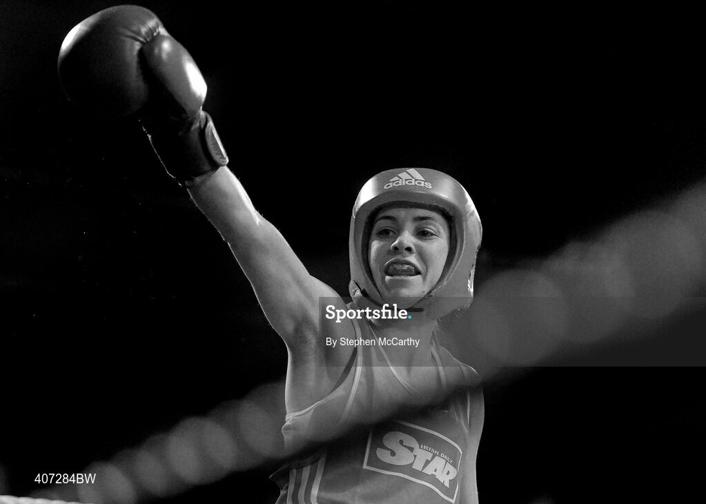 5 March 2010; Jennifer Harte, Four Corners, celebrates her 48kg women's novice final victory over Catherine O'Grady, Clann Naofa, after the referee stopped the contest in the thrid and final round. National Men's & Women's Elite National Championships 2010 Finals - Friday, National Stadium, Dublin. Picture credit: Stephen McCarthy / SPORTSFILE