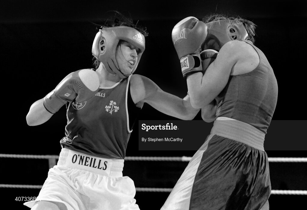 5 March 2010; Katie Taylor, Bray, Ireland, right, exchanges punches with Julia Tsyplakova, Ukraine, during their womens 60kg special bout. National Men's & Women's Elite National Championships 2010 Finals - Friday, National Stadium, Dublin. Picture credit: Stephen McCarthy / SPORTSFILE