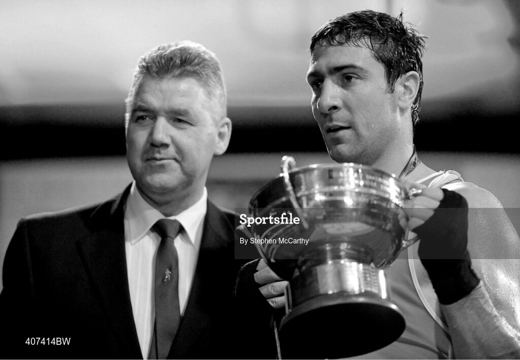 5 March 2010; Kenny Egan, Neilstown, receives his elite 81kg final trophy from former national champion boxer Jim O'Sullivan following his victory over Tommy McCarthy, Oliver Plunketts. Egan matches Jim O'Sullivan's run of ten non-consecutive senior title wins between 1980 and 1990. National Men's & Women's Elite National Championships 2010 Finals - Friday, National Stadium, Dublin. Picture credit: Stephen McCarthy / SPORTSFILE