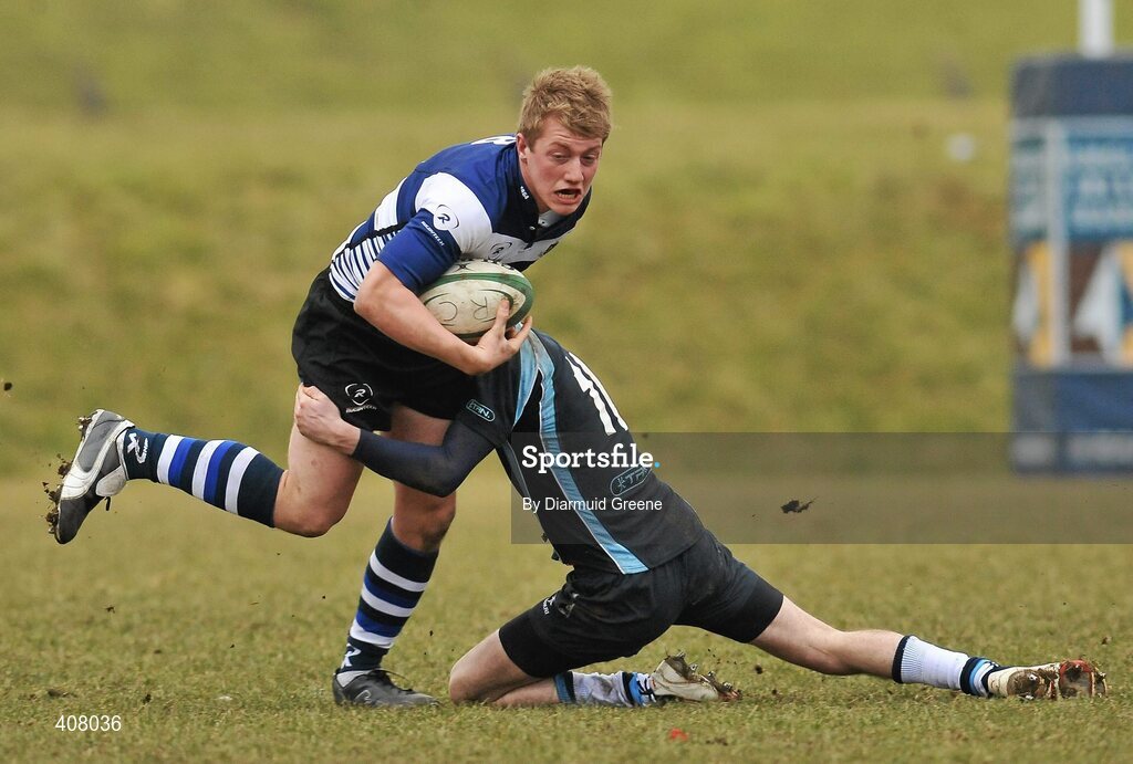 3 March 2010; Luke Cahill, Rockwell, is tackled by Padraig Quinn, Castletroy. Avonmore Munster Rugby Schools Senior Cup Semi-Final, Rockwell v Castletroy College, Clanwilliam Park, Tipperary Town, Tipperary. Picture credit: Diarmuid Greene / SPORTSFILE