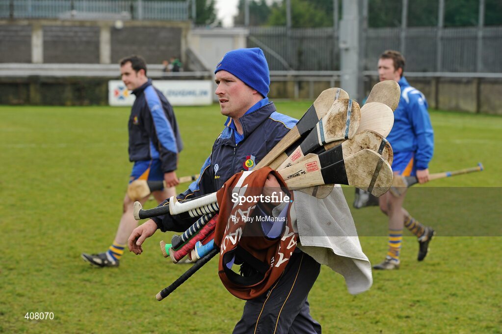 14 February 2010; Johnny 'Waxy' Keane carries spare hurls for the Portumna players. AIB GAA Hurling All-Ireland Senior Club Championship Semi-Final, Portumna v Dunloy Cuchullians, Parnell Park, Dublin. Picture credit: Ray McManus / SPORTSFILE