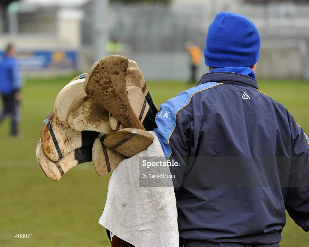 14 February 2010; Johnny 'Waxy' Keane carries spare hurls for the Portumna players. AIB GAA Hurling All-Ireland Senior Club Championship Semi-Final, Portumna v Dunloy Cuchullians, Parnell Park, Dublin. Picture credit: Ray McManus / SPORTSFILE