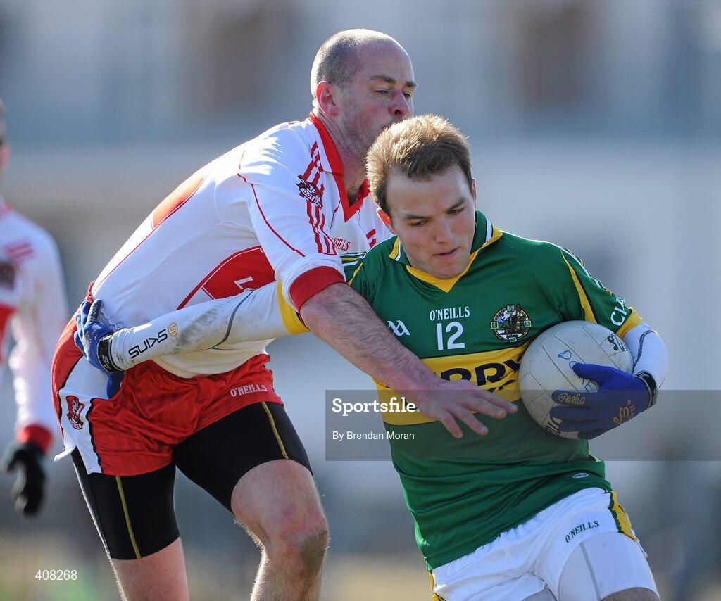 7 March 2010; Darren O'Sullivan, Kerry, holds off the challenge of Kevin McCloy, Derry. Allianz GAA Football National League, Division 1, Round 3, Kerry v Derry, Austin Stack Park, Tralee, Co. Kerry. Picture credit: Brendan Moran / SPORTSFILE
