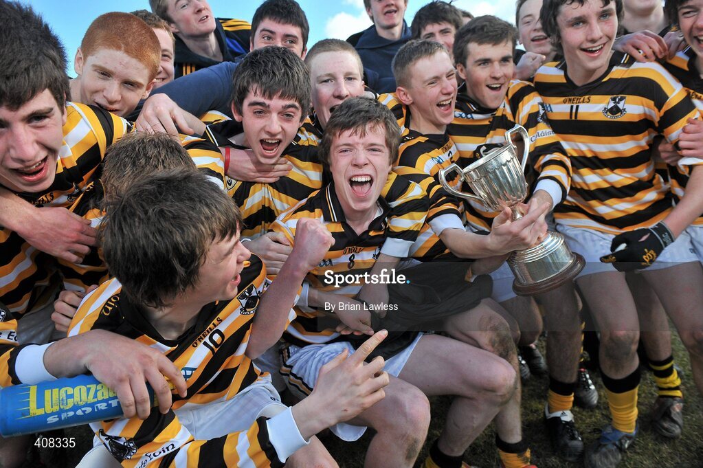 10 March 2010; Colaiste Eoin captain Roibeard Mac Daibhéad, centre, and his team-mates celebrate with the cup. Dublin School Junior Football A Final, St Benildus College v Colaiste Eoin, UCD, Belfield, Dublin. Picture credit: Brian Lawless / SPORTSFILE