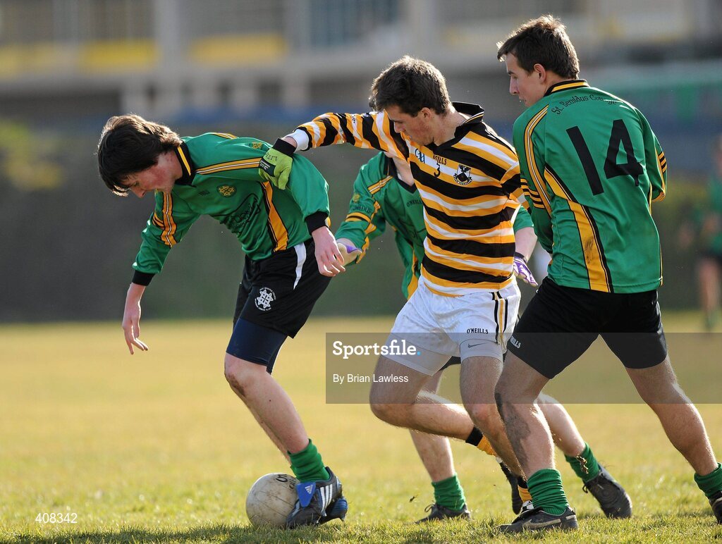 10 March 2010; David Fox, left, and Sean Corcoran, St Benildus College, in action against Luke Ó Treasaigh, Colaiste Eoin. Dublin School Junior Football A Final, St Benildus College v Colaiste Eoin, UCD, Belfield, Dublin. Picture credit: Jack Halpin / SPORTSFILE