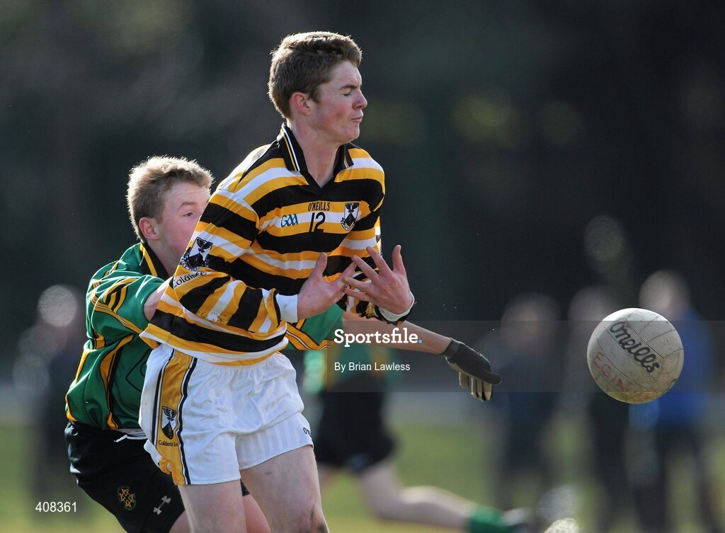 10 March 2010; Dónal Ó Gormlaigh, Colaiste Eoin, in action against Stephen Mulvaney, St Benildus College. Dublin School Junior Football A Final, St Benildus College v Colaiste Eoin, UCD, Belfield, Dublin. Picture credit: Brian Lawless / SPORTSFILE