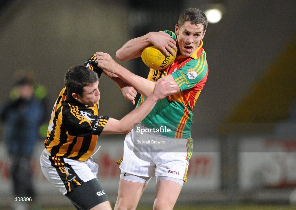 10 March 2010; Brendan Murphy, Carlow, is tackled by Paddy Naughton, Kilkenny. Cadbury Leinster GAA Football Under 21 Quarter-Final, Carlow v Kilkenny, O'Moore Park, Portlaoise, Co. Laois. Picture credit: Matt Browne / SPORTSFILE