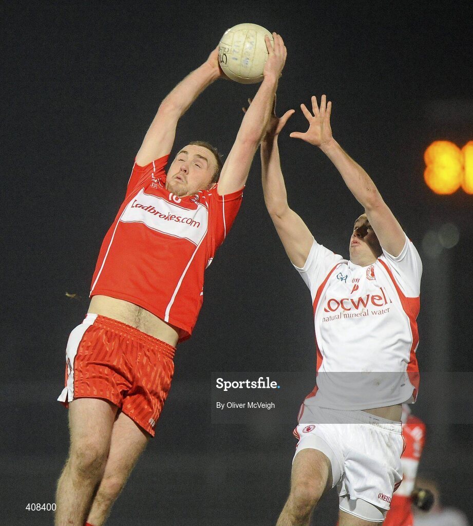 10 March 2010; Emmett McGuckian, Derry, in action against Kyle Coney, Tyrone. Cadbury Ulster GAA Football Under 21 Championship, Preliminary Round, Tyrone v Derry, Healy Park, Omagh, Co. Tyrone. Picture credit: Oliver McVeigh / SPORTSFILE