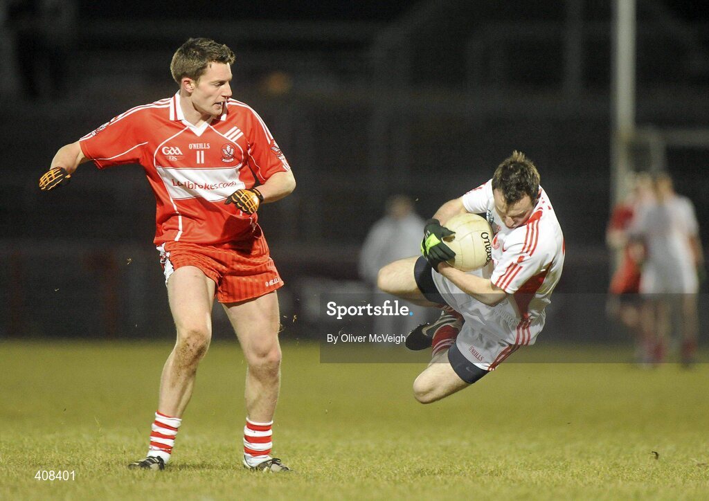 10 March 2010; Aidan Girvan, Tyrone, in action against James Kielt, Derry. Cadbury Ulster GAA Football Under 21 Championship, Preliminary Round, Tyrone v Derry, Healy Park, Omagh, Co. Tyrone. Picture credit: Oliver McVeigh / SPORTSFILE