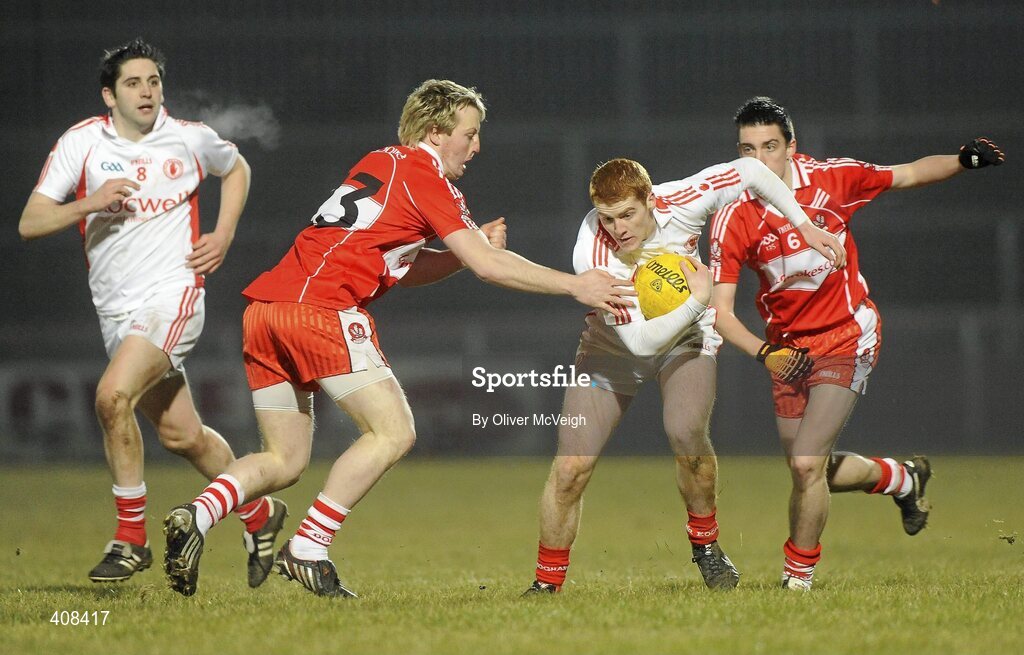10 March 2010; Peter Harte, Tyrone, in action against Ciaran McFeeley, Derry. Cadbury Ulster GAA Football Under 21 Championship, Preliminary Round, Tyrone v Derry, Healy Park, Omagh, Co. Tyrone. Picture credit: Oliver McVeigh / SPORTSFILE