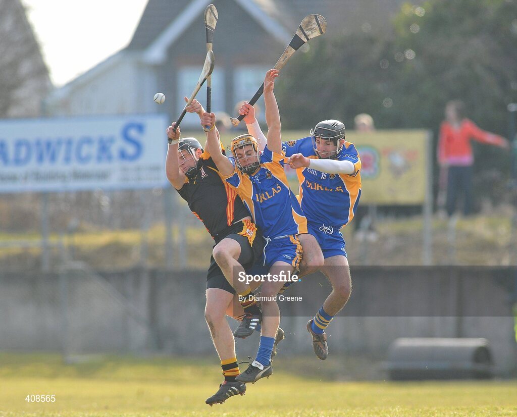 11 March 2010; Alan Dempsey, Ard Scoil Ris, in action against Conor Hammersley and Aiden McCormack, right, Thurles CBS. Harty Cup Final, 2nd Replay, Thurles CBS v Ard Scoil Ris, McDonagh Park, Nenagh, Co. Tipperary. Picture credit: Diarmuid Greene / SPORTSFILE