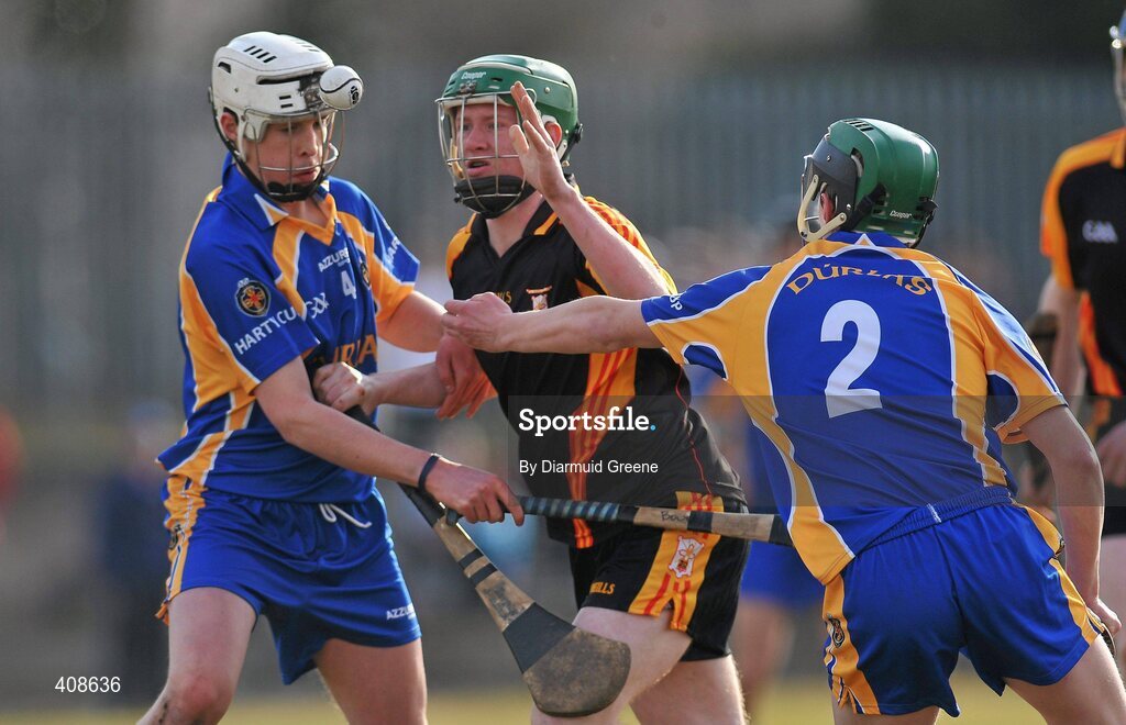11 March 2010; Shane Dowling, Ard Scoil Ris, in action against James Bourke, left, and Pa Dunne, Thurles CBS. Harty Cup Final, 2nd Replay, Thurles CBS v Ard Scoil Ris, McDonagh Park, Nenagh, Co. Tipperary. Picture credit: Diarmuid Greene / SPORTSFILE