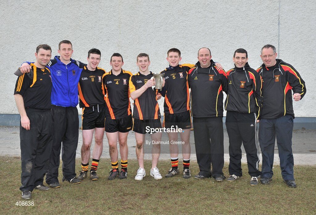 11 March 2010; Ard Scoil Ris players and management team consisting of, from left to right, Liam Cronin, Niall Moran, players Declan Hannon, Alan Dempsey, joint captains Sean O'Brien and Cathal McInerney, manager Derek Larkin, Natal O'Grady and Jimmy Browne celebrate with the DR Harty Cup after victory over Thurles CBS. Harty Cup Final, 2nd Replay, Thurles CBS v Ard Scoil Ris, McDonagh Park, Nenagh, Co. Tipperary. Picture credit: Diarmuid Greene / SPORTSFILE