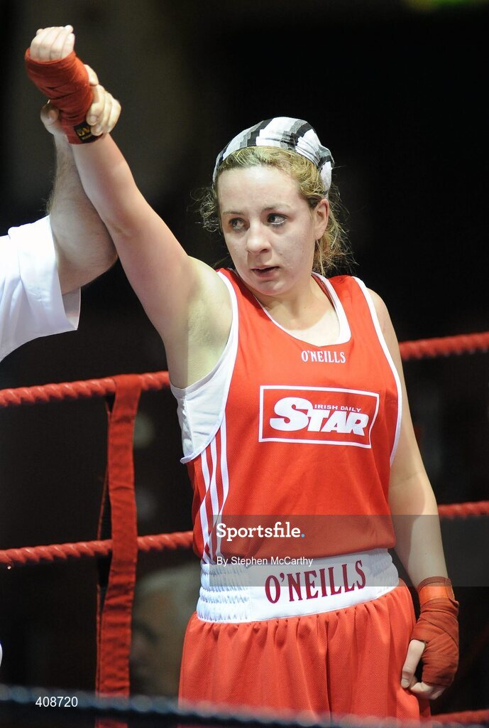 6 March 2010; Noreen Crawford, Dungarvan, is victorious over Frances Rock, Baldoyle, following their women's novice 63kg final bout. Men's Elite & Women's Novice National Championships 2010 Finals - Saturday Evening Session, National Stadium, Dublin. Picture credit: Stephen McCarthy / SPORTSFILE *** Local Caption ***