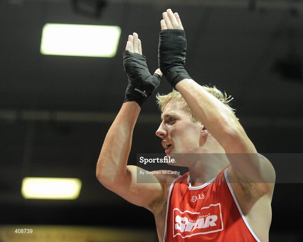 6 March 2010; Eric Donovan, St Michaels Athy, is victorious over David Oliver Joyce, St Michaels Athy, following their men's elite 60kg final bout. Men's Elite & Women's Novice National Championships 2010 Finals - Saturday Evening Session, National Stadium, Dublin. Picture credit: Stephen McCarthy / SPORTSFILE
