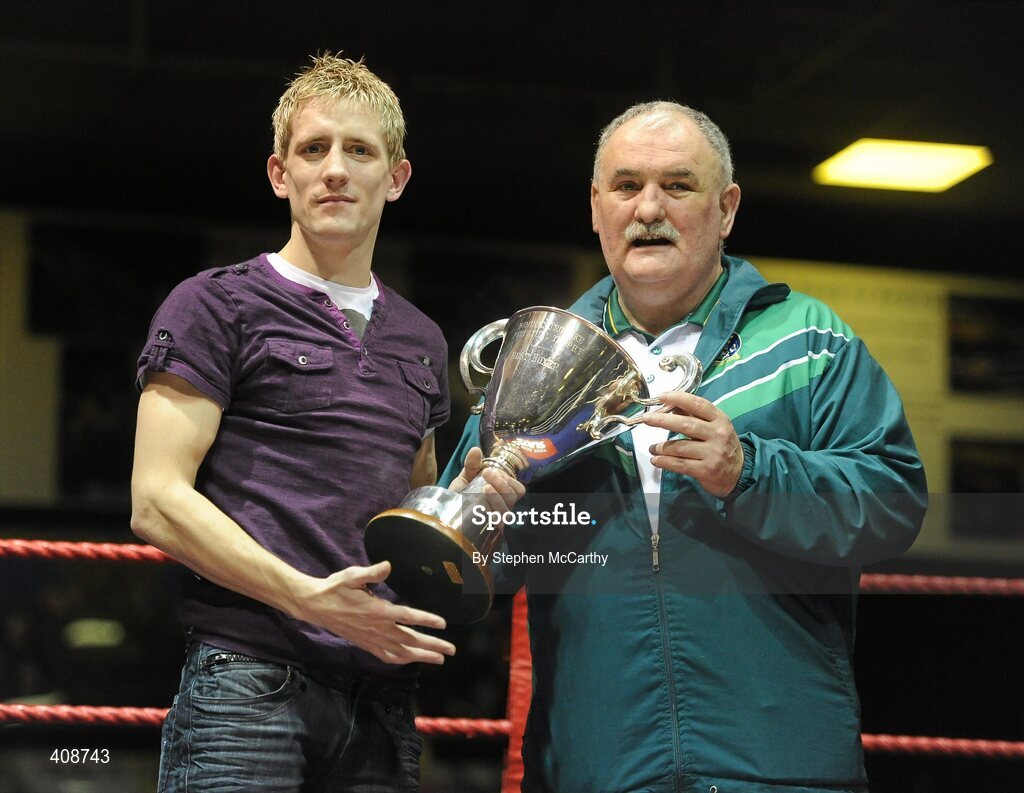 6 March 2010; IABA president Dominic O'Rourke presents Eric Donovan, St Michaels Athy, with the boxer of the tournament award. Men's Elite & Women's Novice National Championships 2010 Finals - Saturday Evening Session, National Stadium, Dublin. Picture credit: Stephen McCarthy / SPORTSFILE