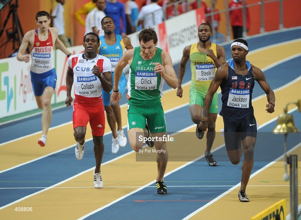 12 March 2010; Ireland's David Gillick races for the finish line on his way to finishing in second place behind Bershawn Jackson, USA, right, during his Men's 400m Semi-Final at the 13th IAAF World Indoor Athletics Championships, Doha, Qatar. Picture credit: Pat Murphy / SPORTSFILE