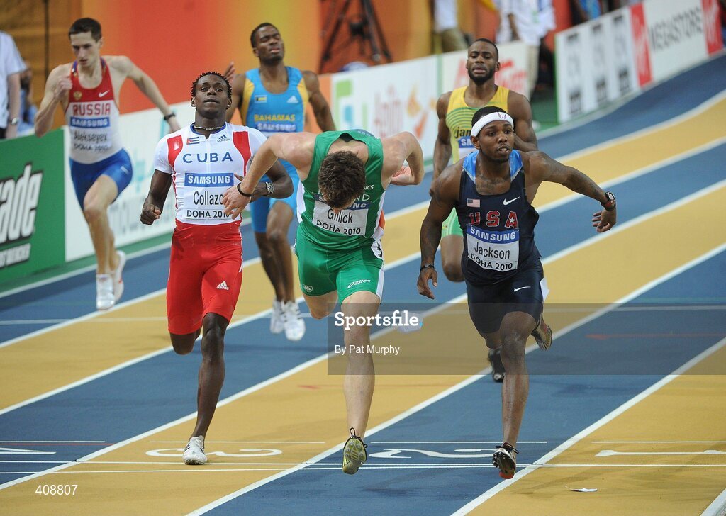 12 March 2010; Ireland's David Gillick crosses the finish line in second place behind Bershawn Jackson, USA, right, during his Men's 400m Semi-Final at the 13th IAAF World Indoor Athletics Championships, Doha, Qatar. Picture credit: Pat Murphy / SPORTSFILE