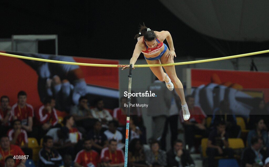 12 March 2010; Elena Isinbaeva, Russia, who cleared a highest mark of 4.55m, on her way to qualifying for the Women's Pole Vault final at the 13th IAAF World Indoor Athletics Championships, Doha, Qatar. Picture credit: Pat Murphy / SPORTSFILE