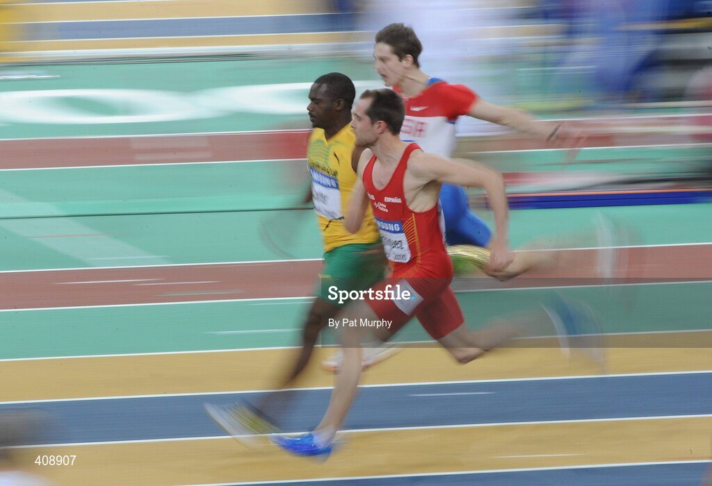 12 March 2010; Eventual winner Ángel David Rodríguez, Spain, nearest to camera, races alongside Jamaica's Nesta Carter, centre, who finished second, and Roman Smirnov, Russia, far side, who finished in 4th position during the Men's 60m heats at the 13th IAAF World Indoor Athletics Championships, Doha, Qatar. Picture credit: Pat Murphy / SPORTSFILE