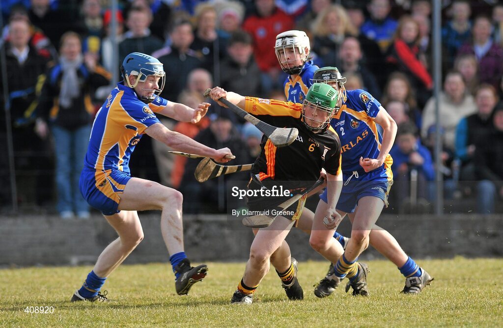 11 March 2010; Shane Dowling, Ard Scoil Ris, in action against, Cathal Carroll, left, James Bourke and Pa Dunne, 2, Thurles CBS. Harty Cup Final, 2nd Replay, Thurles CBS v Ard Scoil Ris, McDonagh Park, Nenagh, Co. Tipperary. Picture credit: Diarmuid Greene / SPORTSFILE