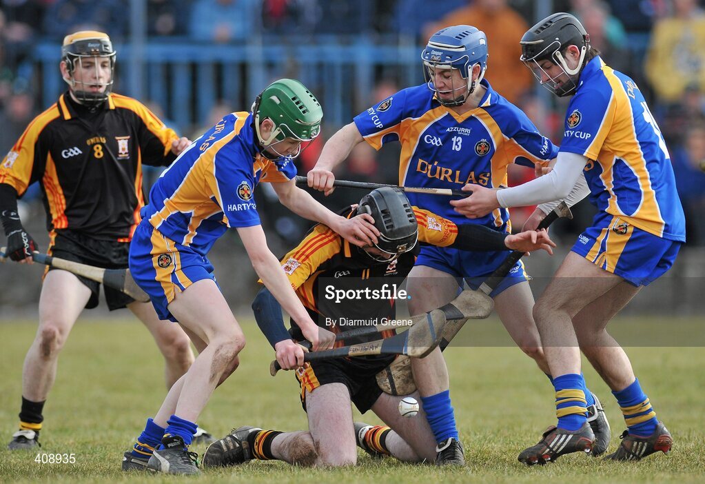 11 March 2010; Declan Hannon, Ard Scoil Ris, in action against from left, John Bergin, Mike O'Brien and Aiden McCormack, Thurles CBS. Harty Cup Final, 2nd Replay, Thurles CBS v Ard Scoil Ris, McDonagh Park, Nenagh, Co. Tipperary. Picture credit: Diarmuid Greene / SPORTSFILE