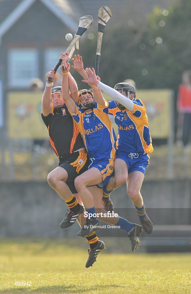 11 March 2010; Alan Dempsey, Ard Scoil Ris, in action against Conor Hammersley and Aiden McCormack, right, Thurles CBS. Harty Cup Final, 2nd Replay, Thurles CBS v Ard Scoil Ris, McDonagh Park, Nenagh, Co. Tipperary. Picture credit: Diarmuid Greene / SPORTSFILE