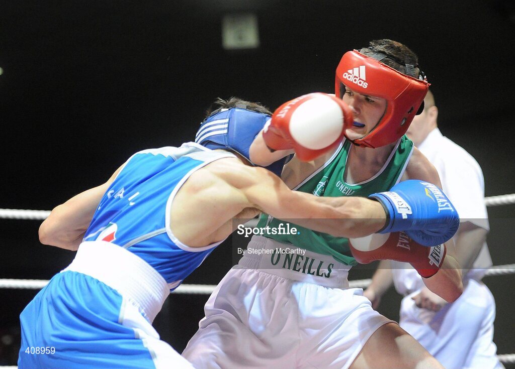 12 March 2010; Gary Molloy, Ireland, exchanges punches with Vincenzo Picardo, Italy, during their 51kg bout. Elite International, National Stadium, Dublin. Picture credit: Stephen McCarthy / SPORTSFILE