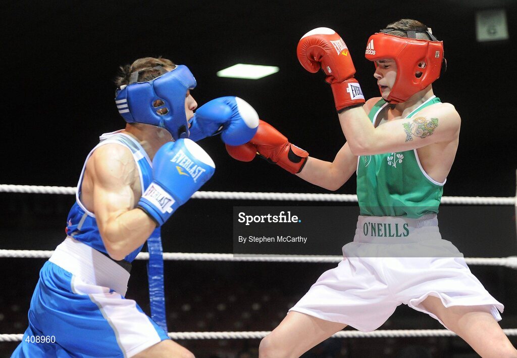 12 March 2010; Gary Molloy, Ireland, exchanges punches with Vincenzo Picardo, Italy, during their 51kg bout. Elite International, National Stadium, Dublin. Picture credit: Stephen McCarthy / SPORTSFILE