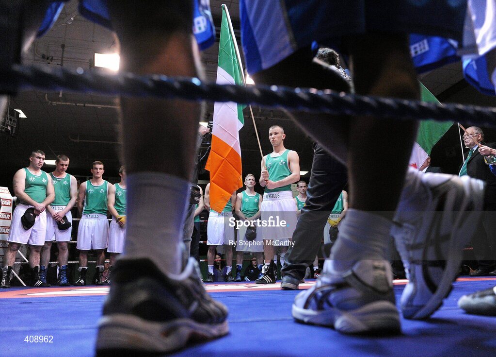 12 March 2010; Ireland's John Joe Nevin holds the Irish flag during the National Anthem. Elite International, National Stadium, Dublin. Picture credit: Stephen McCarthy / SPORTSFILE