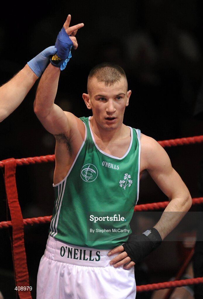 12 March 2010; John Joe Nevin, Ireland, is announced victorious over Vittorio Parrinello, Italy, during their 54kg bout. Elite International, National Stadium, Dublin. Picture credit: Stephen McCarthy / SPORTSFILE