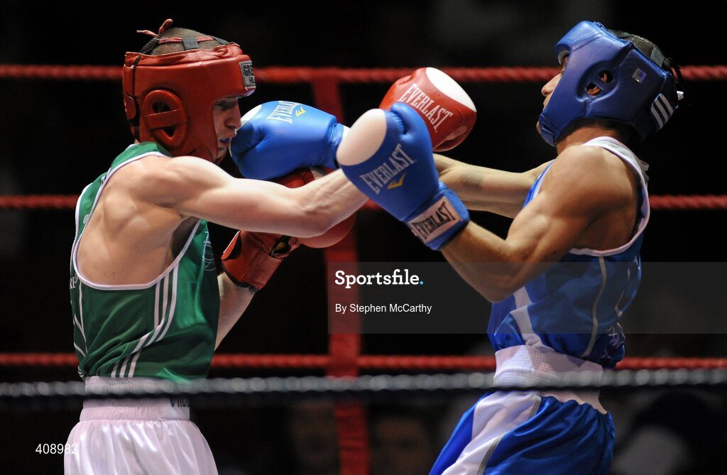 12 March 2010; Gary Molloy, Ireland, exchanges punches with Vincenzo Picardo, Italy, during their 51kg bout. Elite International, National Stadium, Dublin. Picture credit: Stephen McCarthy / SPORTSFILE
