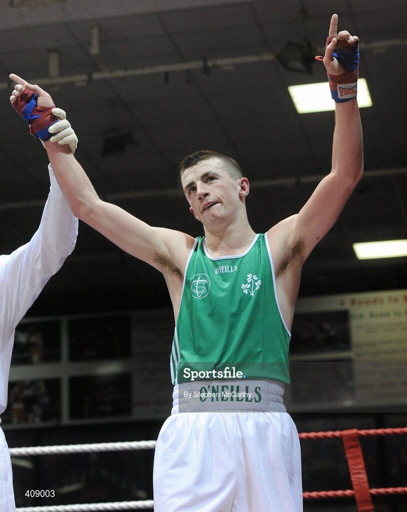 12 March 2010; Tyrone McCullagh, Ireland, is victorious over Alessio Di Sevino, Italy, following their 57kg bout. Elite International, National Stadium, Dublin. Picture credit: Stephen McCarthy / SPORTSFILE