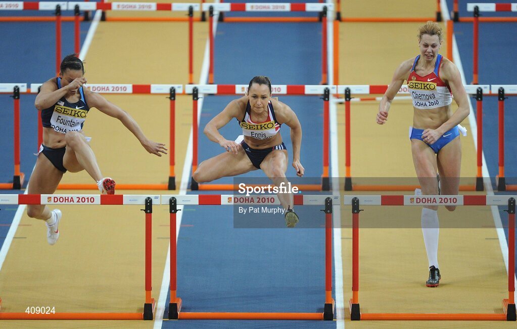 13 March 2010; Jessica Ennis, Great Britain, races clear of the field to win the 60m Hurdles race during the Women's Pentathlon at the 13th IAAF World Indoor Athletics Championships, Doha, Qatar. Picture credit: Pat Murphy / SPORTSFILE